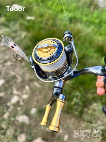 Shimano Stella C2000S, снимка 6 - Макари - 46645792