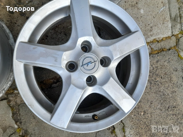 Продава алуминиеви джанти Опел,4х100,15 цола, снимка 4 - Гуми и джанти - 54258968