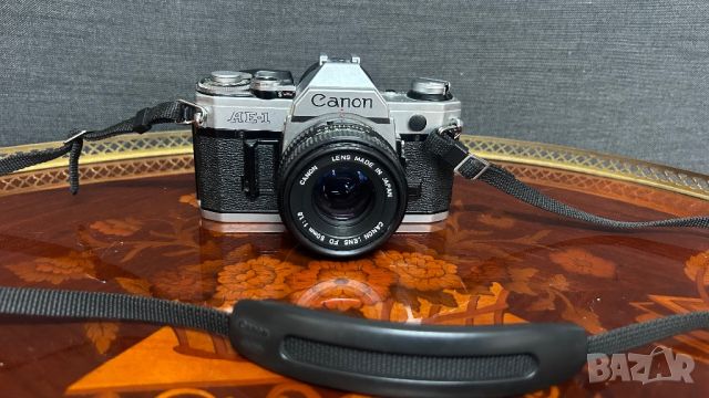 Фотоапарат Canon Ae-1 с обектив 1:1,8 50мм Canon, снимка 1 - Фотоапарати - 45931378