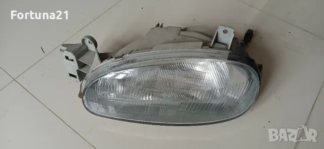 Mazda 121 - ляв фар, снимка 1