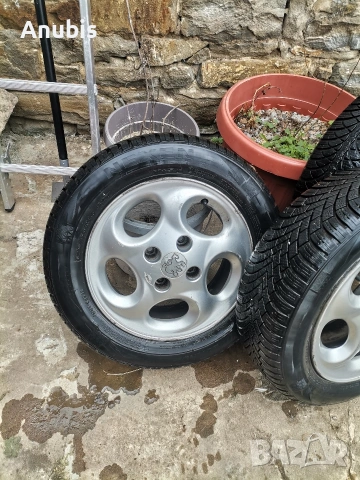 Джанти с зимни гуми 14 Пежо , снимка 5 - Гуми и джанти - 53709423