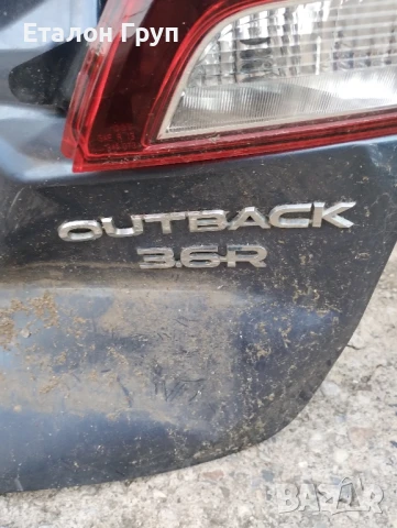 Емблеми  Subaru Outback 