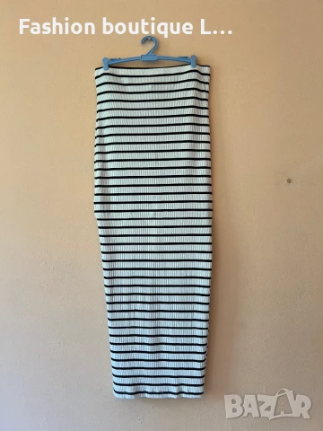 Дълга Бяла пола на черно райе 38 размер с цепка отзад и ластик в кръстта 🤍🖤