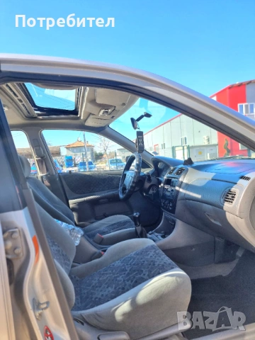 Mazda 323 Газ бензин, снимка 14 - Автомобили и джипове - 53667646