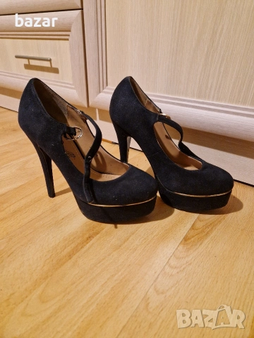 Обувки на висок ток