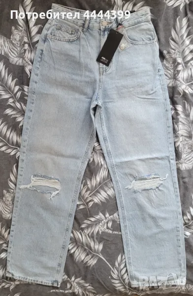 Дамски дънки с разкроен крачол., снимка 1