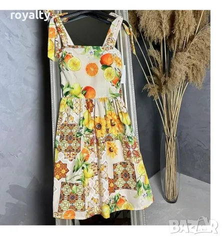 Кокетна лятна рокля с портокали и панделки
