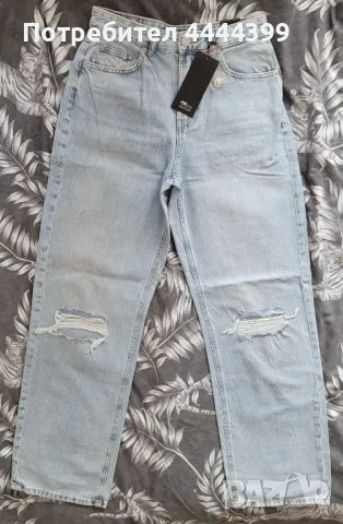 Дамски дънки с разкроен крачол., снимка 1