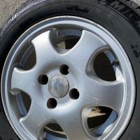Зимни гуми с алуминиеви джанти 185/65/14, снимка 9 - Гуми и джанти - 45491971