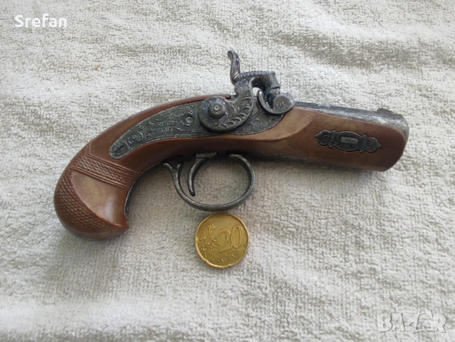 Капсулен пистолет 