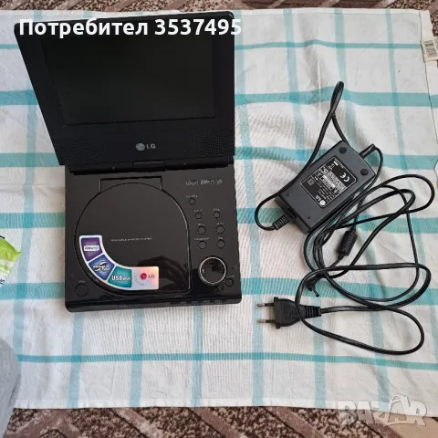 DVD player mod DP271, снимка 6 - Плейъри, домашно кино, прожектори - 49218807