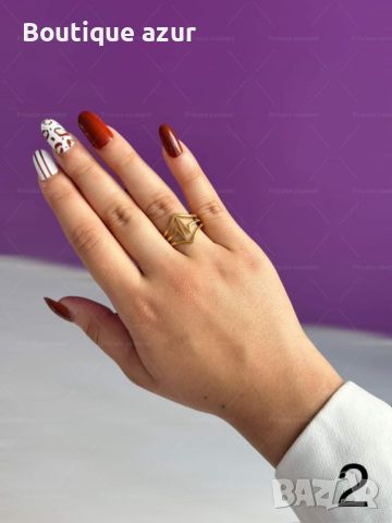 Дамски пръстен от неръждаема стомана със златисто покритие и красива текстура, снимка 1 - Пръстени - 45470343