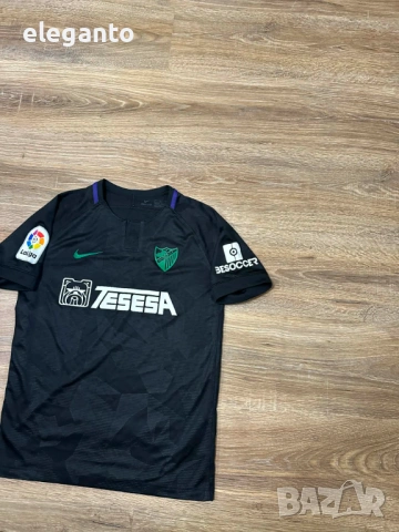 Оригинална Юношеска футболна тениска Nike Malaga CF 2018 2019  Away/Гостуваща , 158/170 размер , снимка 2 - Футбол - 53996508