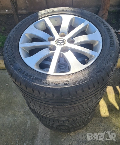 Оригинални лети джанти за Mazda 16 цола 5х114.3 с летни гуми Continental, снимка 4 - Гуми и джанти - 53669167