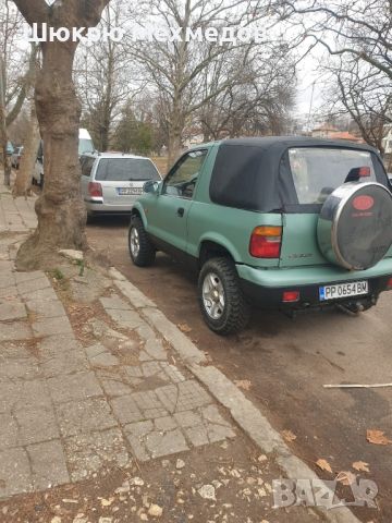 Kia Sportage 2.0 128 ks, снимка 7 - Автомобили и джипове - 46352087