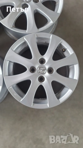 ОРИГИНАЛНИ АЛУМИНИЕВИ ДЖАНТИ ЗА МАЗДА -4Х100Х54-15цола, снимка 4 - Гуми и джанти - 53632405