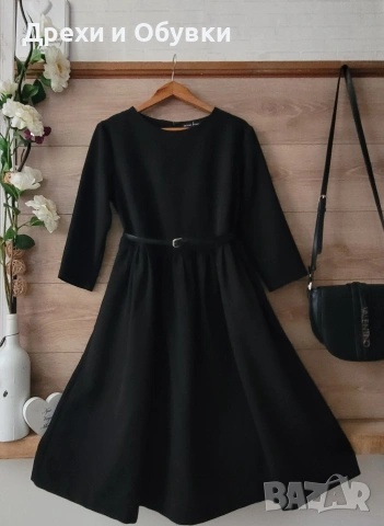 Черна официална елегантна разкроена рокля с джобове 