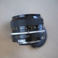 Nikon Nikkor 50mm f2 ръчнофокусен твърд обектив, снимка 2 - Обективи и филтри - 45289511