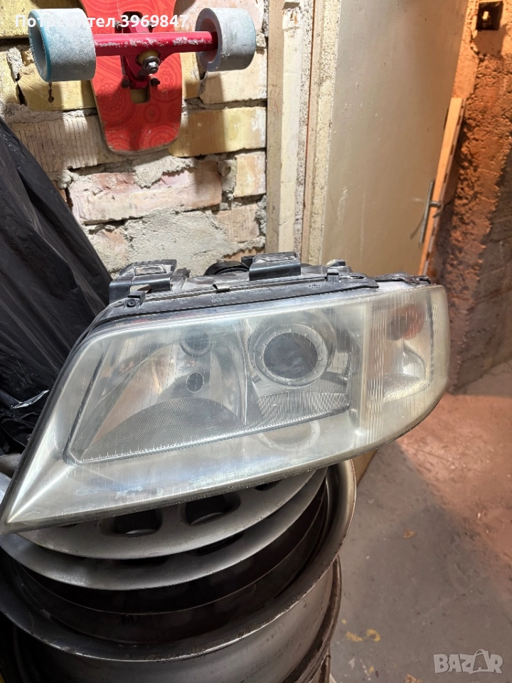 Оригинален ляв (шофьорски) фар Hellа за Audi A6 C5 - преди фейслифт, снимка 1