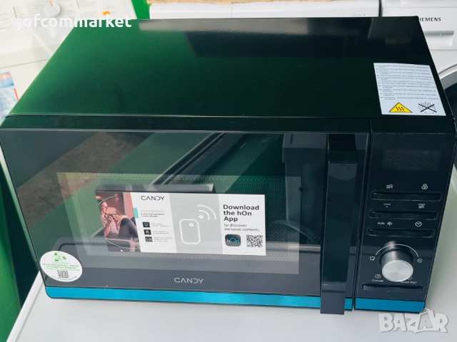 Микровълновата фурна с грил Candy Moderna, 700 W, 20л., снимка 2 - Микровълнови - 53885909