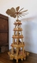 Красива многоетажна коледна пирамида от естествено дърво. Изработена с фини дърворезби и фигурки., снимка 3