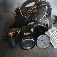 Фотоапарат Nikon coolpix L110 с чанта и зарядно, снимка 7 - Фотоапарати - 45115458