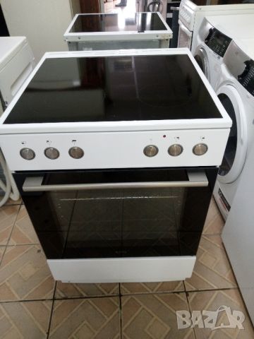 Като нова свободно стояща печка с керамичен плот Asko 60 см широка 2 години гаранция!, снимка 1 - Печки, фурни - 45680116