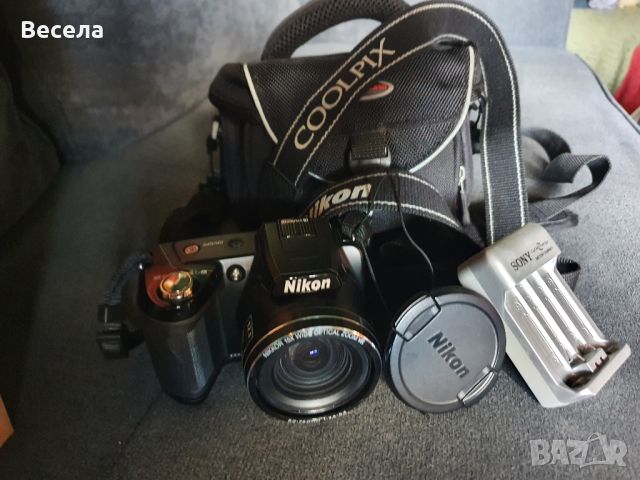 Фотоапарат Nikon coolpix L110 с чанта и зарядно, снимка 7 - Фотоапарати - 45115458