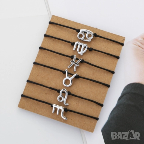 Регулируема гривна с черна връв и зодиакални символи 