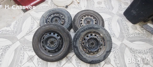 зимни гуми с джанти 4х100 /56,1, снимка 3 - Гуми и джанти - 50683266