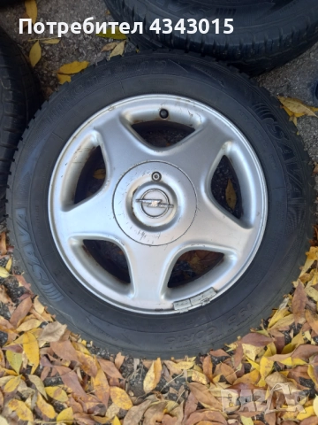 4 броя гуми с гуми , снимка 3 - Гуми и джанти - 52110642