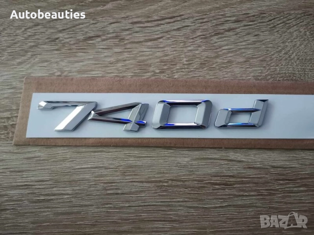сребриста емблема BMW 740d