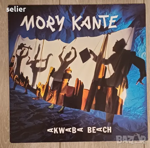 Mory Kanté ‎– Akwaba Beach Немско издание 1985г Състояние на винила:визуално е NEAR MINT Звучи като , снимка 1 - Грамофонни плочи - 49047491