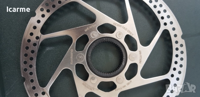Велосипеден диск Shimano 180mm, снимка 3 - Части за велосипеди - 51513330