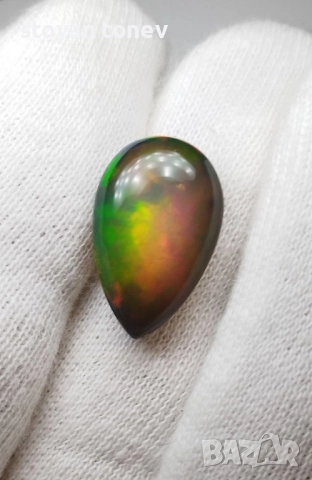 Голям черен опал с патерн Медна пита и впечатляващи отблясъци 9.22кт.! Нов!, снимка 8 - Други - 50925535