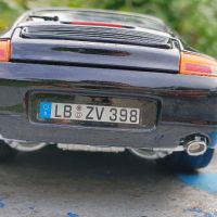 Продавам Porsche Carrera 911 1/18 Burago , снимка 7 - Колекции - 45579224