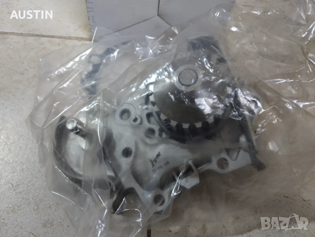 Водна помпа Дачия Сандеро банзин1,4, снимка 2 - Части - 53629949