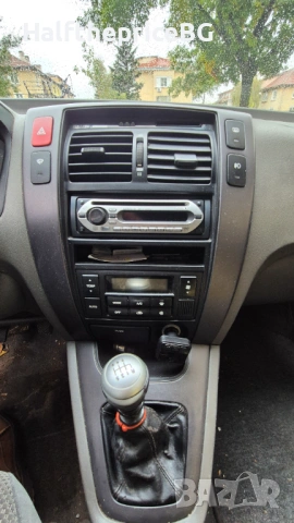 Hyundai Tucson 2.0crdi 16v 4x4, снимка 10 - Автомобили и джипове - 54045041