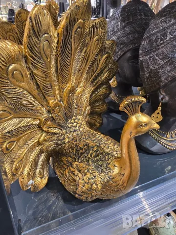 статуетка паун