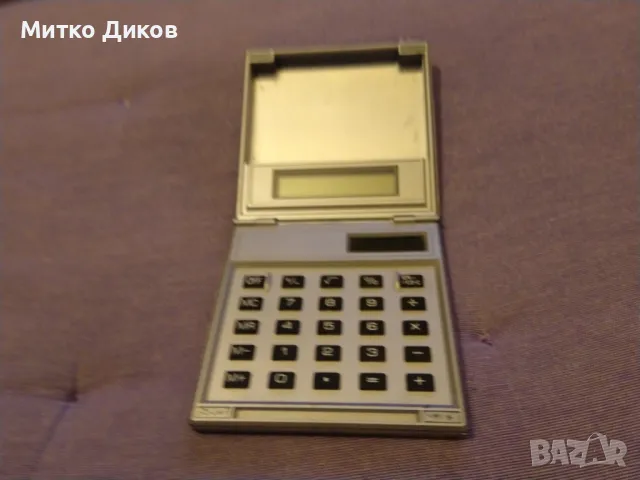 Philip Morris  calculator слънчев без батерия само светлина трябва винтидж марков работещ, снимка 5 - Други - 50258172