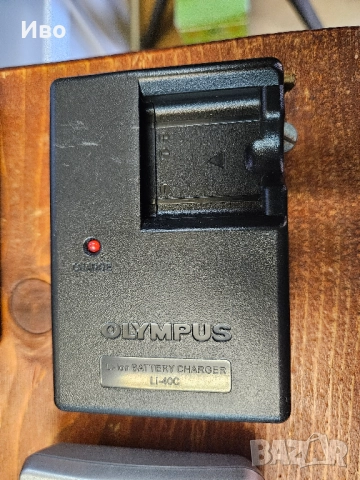 Зарядно за фотоапарат Olympus CASIO  Зарядно за батерия на фотоа, има зарядно и калъф за съхранение., снимка 7 - Батерии, зарядни - 52128509