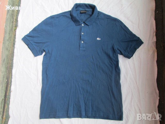 Lacoste тъмно синя тениска размер L.