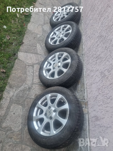 14 цола 4х100 4 броя алуминиеви джанти с гуми 185/60/14, снимка 7 - Гуми и джанти - 52267659