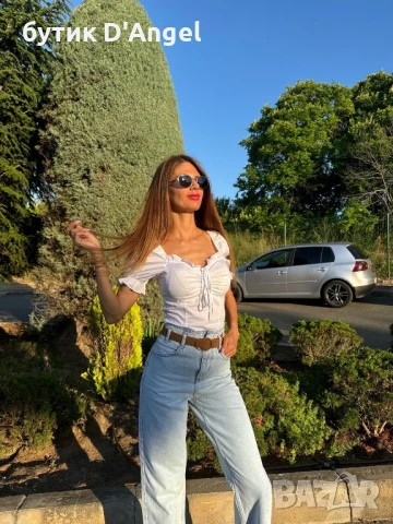 Кокетна блуза в бяло с къдрички