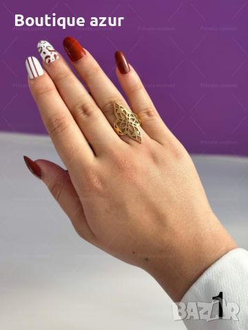 Голям дамски пръстен от неръждаема стомана с интересен дизайн