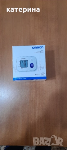 Продавам нов апарат за измерване на кръвното налягане на китката OMRON 