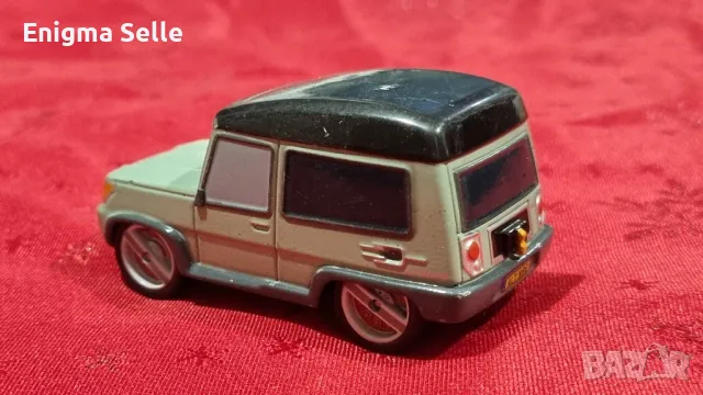 Метална колекционерска кола Disney Store CARS 2 MILES AXLEROD 1:43, снимка 2 - Колекции - 50010536