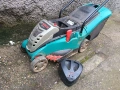 BOSCH Rotak 34 Li - Акумулаторна косачка за трева със зарядно, снимка 1