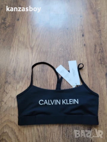 Calvin Klein Performance Low Support Sport Bra - страхотно дамско бюстие НОВО М, снимка 6 - Корсети, бюстиета, топове - 50886796