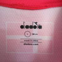 Нова със етикет. Много хубава оригинална спортна блузка.  diadora , снимка 3 - Тениски - 45633279